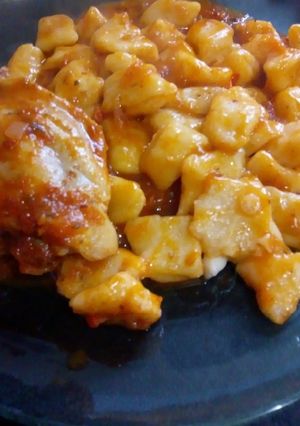 Una foto de Ñoquis de papa y zapallo con Salsa de Pollo