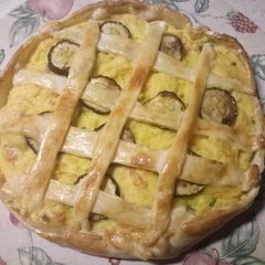 A picture of Salmon, saffron and vegetable pie.