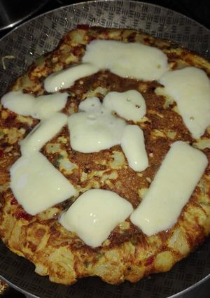 Una foto de Tortilla de papa y zapallito