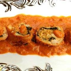 A picture of Chicken breast roll..with mango gravy..stuffing with raw mango.