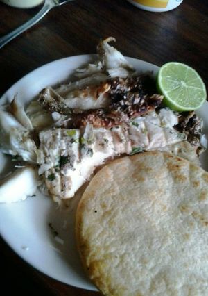 Una foto de Corvina a las hierbas