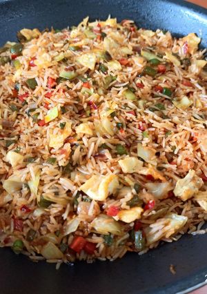 A picture of Schezwan Egg Fried Rice.