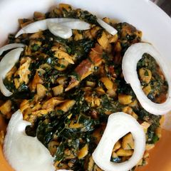 Unripe plantain porridge with smoked fish and vegetables A picture of Unripe plantain porridge with smoked fish and vegetables.
