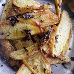 Kasuri Methi Fried Potato Wedges A picture of Kasuri Methi Fried Potato Wedges.