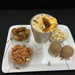 A picture of Chikku &Dry fruit and nuts milkshake.