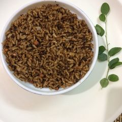 A picture of Ellalu Sadam(Black sesame rice).