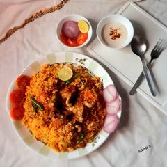 A picture of Butter Chicken Biryani.