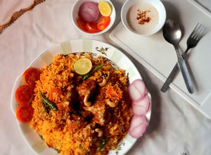 A picture of Butter Chicken Biryani.