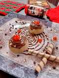 Coffee panacotta with hazelnut spread spirals and crushed wafers