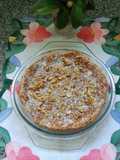 Tarta con masa de merengue de coco con dulce de leche y nueces