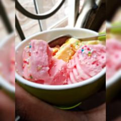 A picture of Strawberry and fresh vanilla ice cream*.