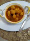 Moong dal and posto savoury laddu curry