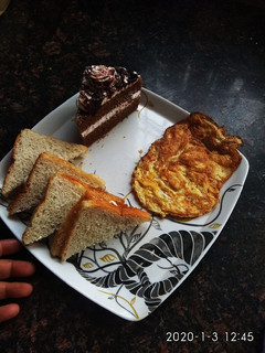 A picture of Bread toast cheese spread.