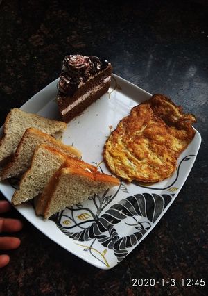 A picture of Bread toast cheese spread.