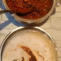 A picture of Ugali with beef and sukuma.