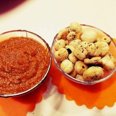 A picture of Foxnuts with red gravy.