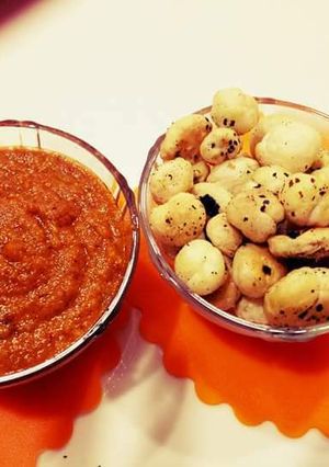 A picture of Foxnuts with red gravy.