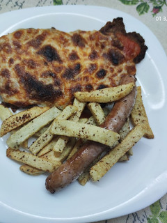 Una foto de Escalope Milanesa a la Napolitana