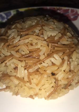 A picture of Rice with Vermicelli and Onion.