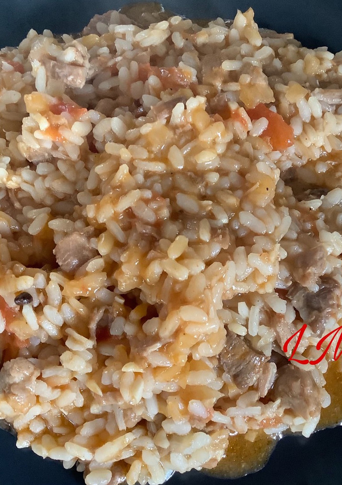 Una foto de Arroz con carne