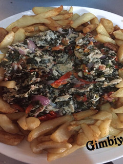 A picture of Moringa egg sauce and chips #B/Fast #Abuja.