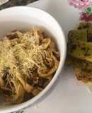 Tallarines con boloñesa con tomates asados
