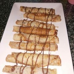 A picture of Chocolate-Filled Crepes 🍫🤎🥞.