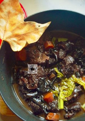 A picture of Braised Beef Cheeks with Red Wine and Black Trumpet Mushrooms.