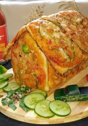 A picture of Hut shape pizza 🍕.