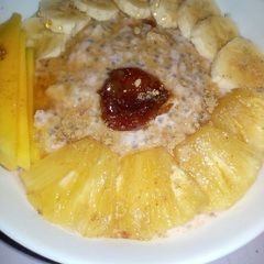 A picture of Overnight oats with tropical fruits.