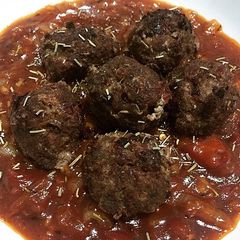 A picture of Homemade Meatballs with Bolognese Sauce.