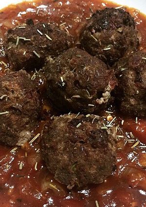 A picture of Homemade Meatballs with Bolognese Sauce.