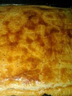 Una foto de Empanada de carne picada con pimientos