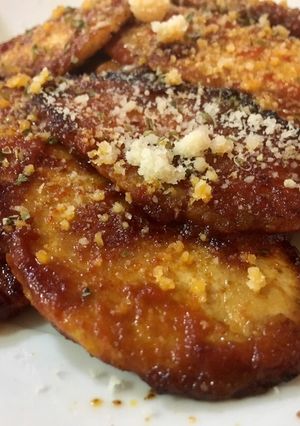 Foto principal de Lomitos de cerdo con tomatico y queso al toque de orégano