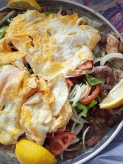 صورة لوصفة باقلاء بالدهن (الفول)
