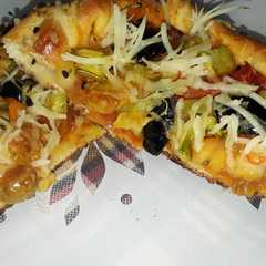 รูปของ ميني بيتزا ذوق رائع 🍕🍕🍕😋😋😋