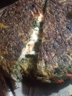 Una foto de Tortilla de acelga rellena