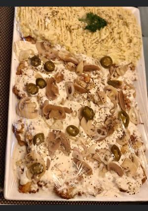 A picture of Mushroom and pepper chicken steak.