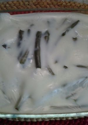 Una foto de Chauchas con salsa blanca