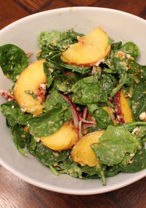 A picture of Spinach, Peach and Goat Cheese Salad.