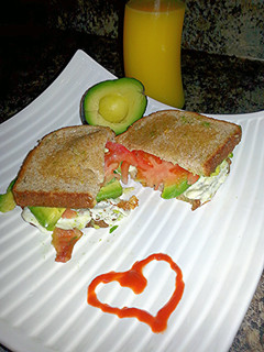 A picture of Avocado, Tomato, Mozzarella, & Bacon Sandwich.