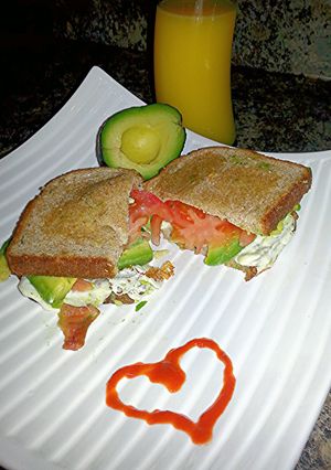 A picture of Avocado, Tomato, Mozzarella, & Bacon Sandwich.