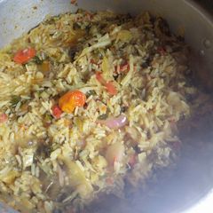 A picture of Jollof rice with vegitable.