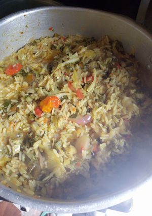 A picture of Jollof rice with vegitable.