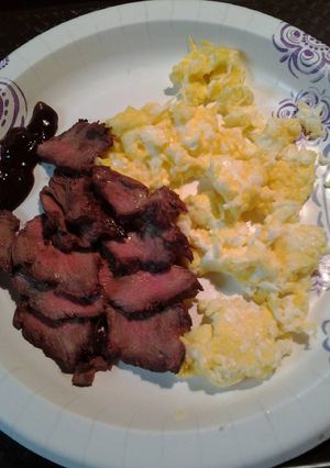 A picture of Breakfast steak and eggs.