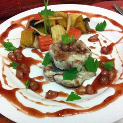 A picture of Kanya's Baked Sea Bass With Pink Honey Sauce.