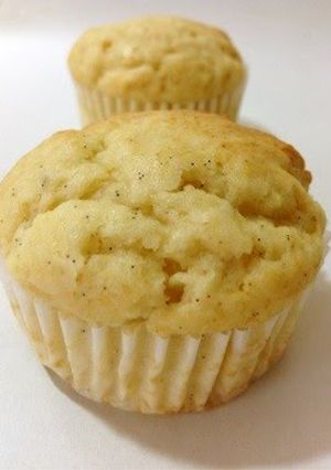 A picture of Muffins with Whipped Cream.