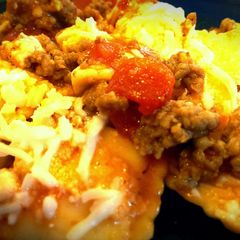 A picture of Cheesy Ravioli and Italian Sausage Skillet.
