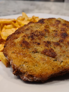 Una foto de Cachopo de jamón y queso azul