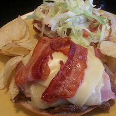 A picture of Chivito Canadiense (Uruguayan steak sandwich- Canadian style).